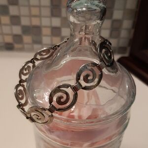 Elegant Silver Swirl Bracelet